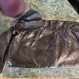 Prada Dark Leather Wristlet with Gold Accent